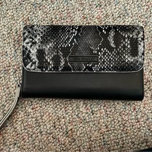Vera Bradley faux leather wristlet, used. Black snake skin look. Good condition